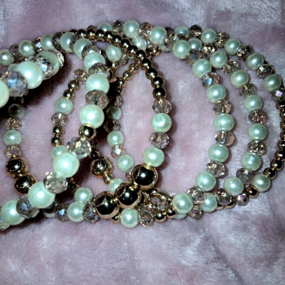 Spiral gold and white bracelet.